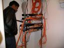 Sanjay examining PacketFront ASRs in basement of apartment block