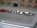 Parked cars seen from 6th floor; yes, that is snow on the first car
